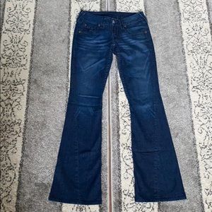 True religion twisted leg jeans.